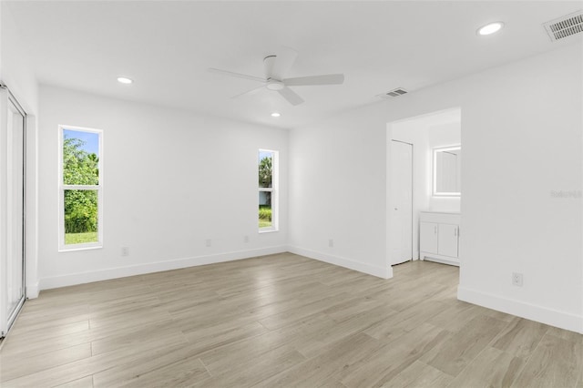 2399 Redstone Ave, North Port, FL 34288 - unfurnished room featuring ceiling fan, light wood finished floors, and recessed lighting