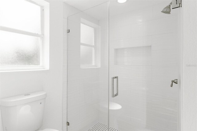 2399 Redstone Ave, North Port, FL 34288 - full bathroom featuring toilet and a stall shower