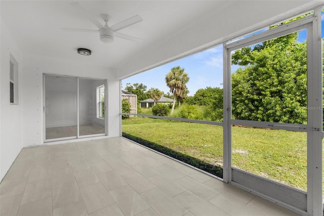 2399 Redstone Ave, North Port, FL 34288 - unfurnished sunroom with ceiling fan and healthy amount of natural light