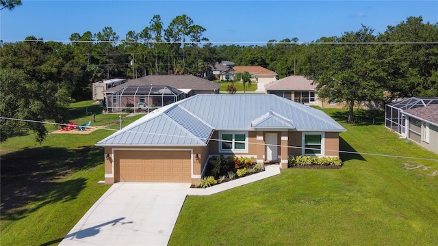 5493 Jody Ave, North Port, FL 34288 - view of front of property featuring driveway, an attached garage, stucco siding, and a front yard