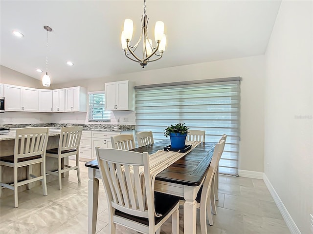 5493 Jody Ave, North Port, FL 34288 - dining area with a chandelier, vaulted ceiling, and recessed lighting