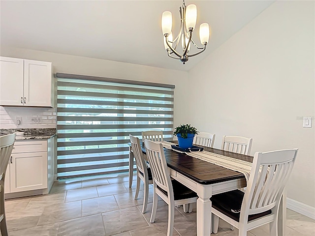5493 Jody Ave, North Port, FL 34288 - dining area featuring a chandelier and lofted ceiling