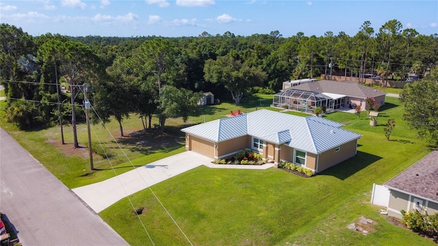 5493 Jody Ave, North Port, FL 34288 - view from above of property featuring a heavily wooded area