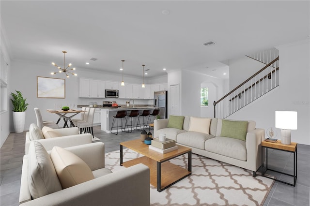 17395 Palmetto Pass Ln, Punta Gorda, FL 33982 - living area featuring a chandelier, recessed lighting, ornamental molding, stairway, and light tile patterned floors