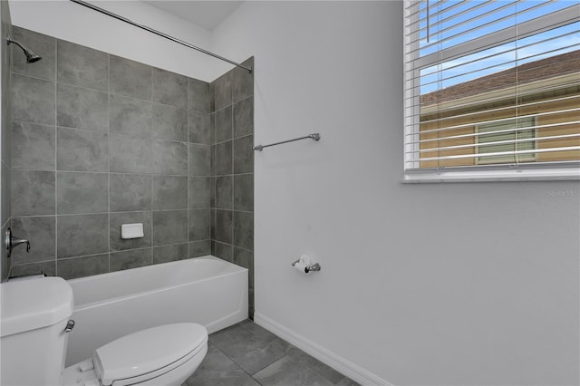 17395 Palmetto Pass Ln, Punta Gorda, FL 33982 - bathroom featuring shower / washtub combination and tile patterned floors
