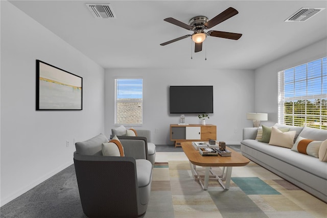 17395 Palmetto Pass Ln, Punta Gorda, FL 33982 - living room featuring ceiling fan and baseboards