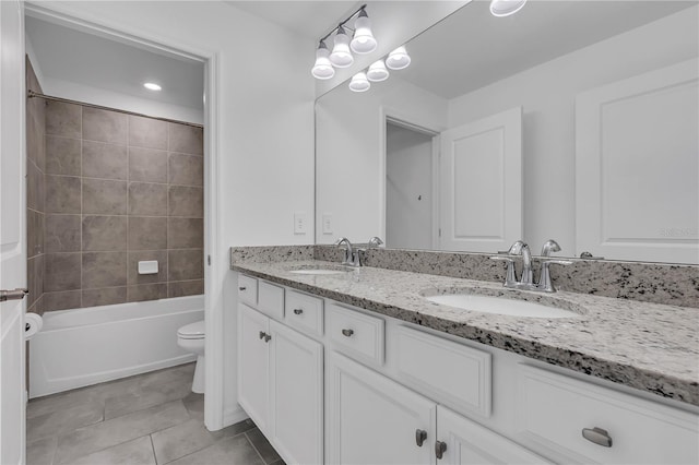 17395 Palmetto Pass Ln, Punta Gorda, FL 33982 - bathroom with double vanity, tile patterned flooring, shower / bathtub combination, and recessed lighting