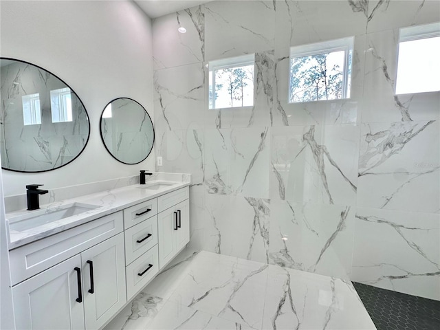 4748 Sylvania Ave, North Port, FL 34286 - full bathroom featuring double vanity, marble tiled flooring, stone wall, and a marble finish shower