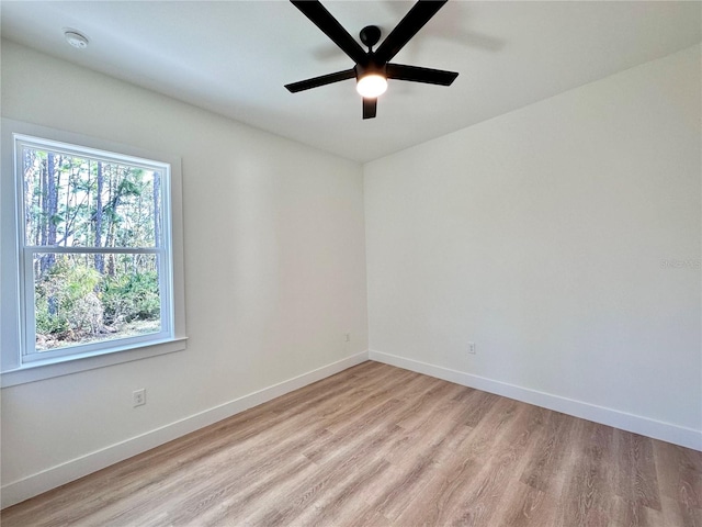 4748 Sylvania Ave, North Port, FL 34286 - spare room with ceiling fan, light wood-style flooring, and a smoke detector