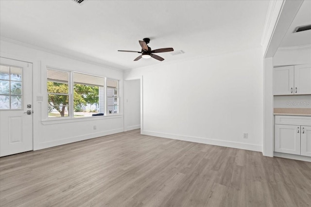 315 Durrance St, Punta Gorda, FL 33950 - unfurnished living room featuring crown molding, light wood-style flooring, and ceiling fan
