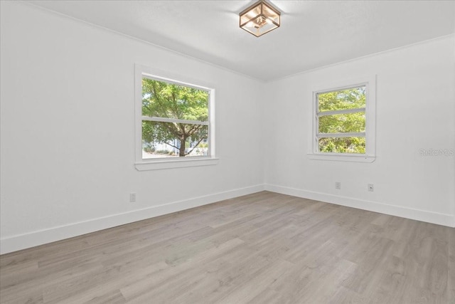 315 Durrance St, Punta Gorda, FL 33950 - spare room featuring light wood-type flooring and baseboards