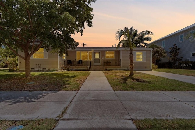 315 Durrance St, Punta Gorda, FL 33950 - single story home featuring a porch and a front yard