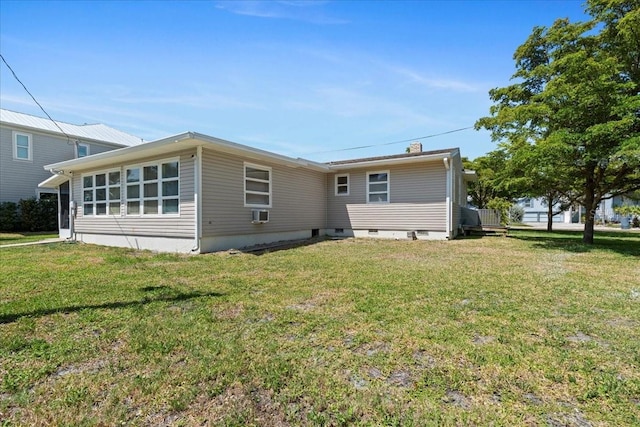 315 Durrance St, Punta Gorda, FL 33950 - rear view of property with a lawn and crawl space