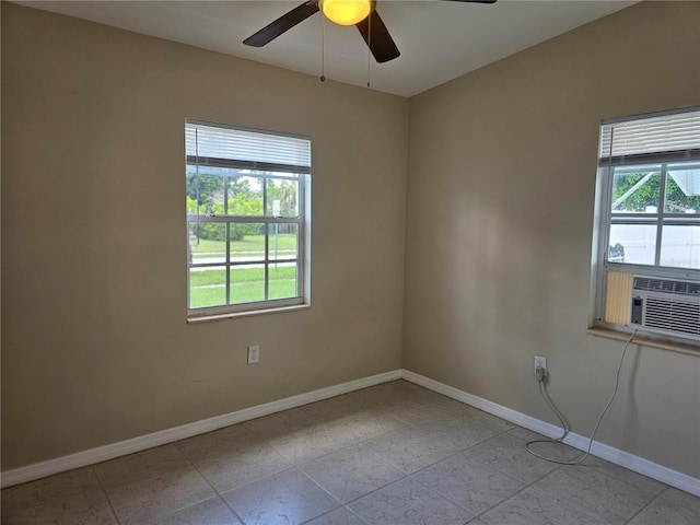 21552 Holdern Ave, Port Charlotte, FL 33952 - tiled spare room featuring baseboards and ceiling fan
