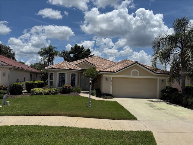 2760 Royal Palm Dr, North Port, FL 34288 - mediterranean / spanish-style house with stucco siding, a garage, driveway, a front lawn, and a tiled roof