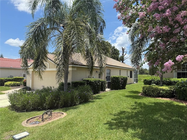 2760 Royal Palm Dr, North Port, FL 34288 - view of side of home with an attached garage, stucco siding, a yard, and concrete driveway