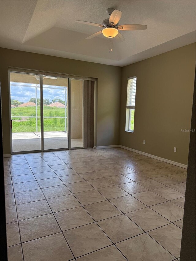 2760 Royal Palm Dr, North Port, FL 34288 - unfurnished room with light tile patterned floors and a ceiling fan