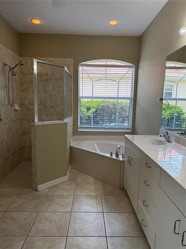 2760 Royal Palm Dr, North Port, FL 34288 - full bathroom featuring a tile shower, a garden tub, vanity, tile patterned flooring, and recessed lighting