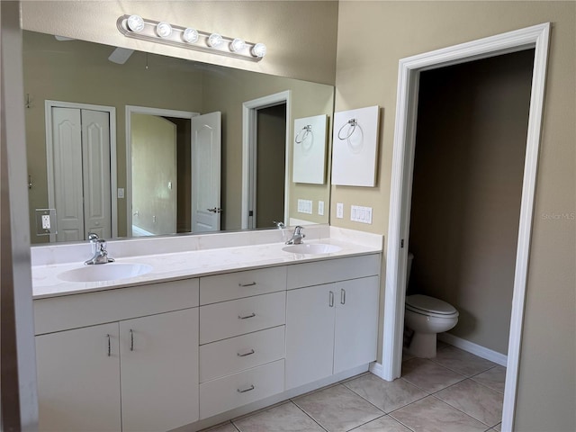 2760 Royal Palm Dr, North Port, FL 34288 - bathroom featuring double vanity and tile patterned flooring