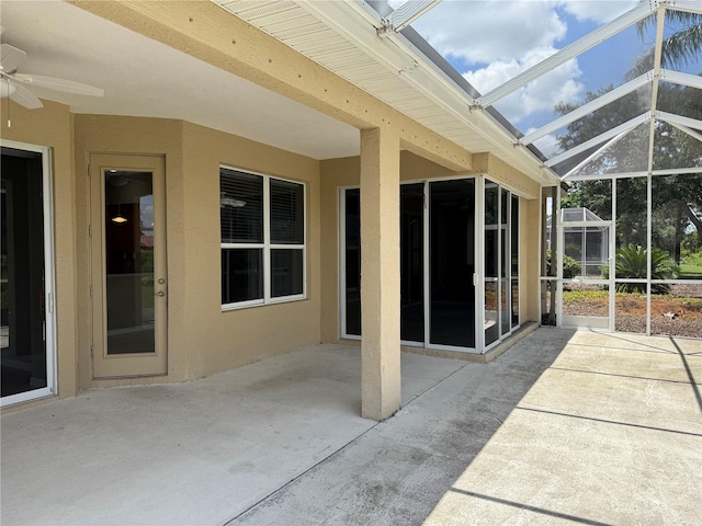2760 Royal Palm Dr, North Port, FL 34288 - view of patio / terrace featuring a ceiling fan and glass enclosure