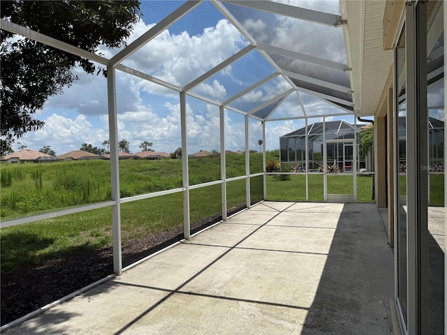 2760 Royal Palm Dr, North Port, FL 34288 - unfurnished sunroom featuring lofted ceiling