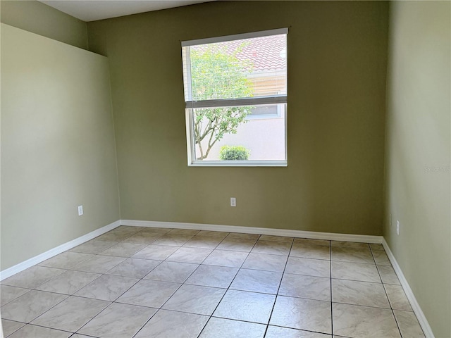 2760 Royal Palm Dr, North Port, FL 34288 - empty room featuring light tile patterned floors