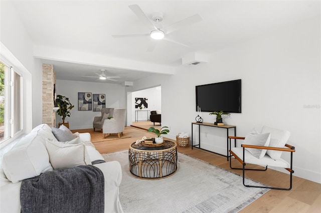 11772 96th Pl, Seminole, FL 33772 - living area with a ceiling fan and wood finished floors