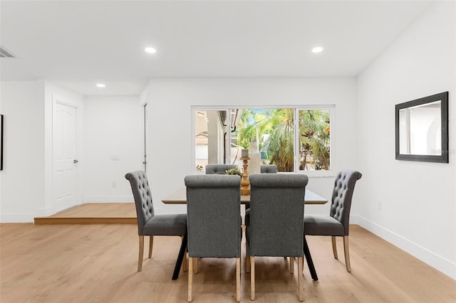 11772 96th Pl, Seminole, FL 33772 - dining space with light wood-style flooring and recessed lighting