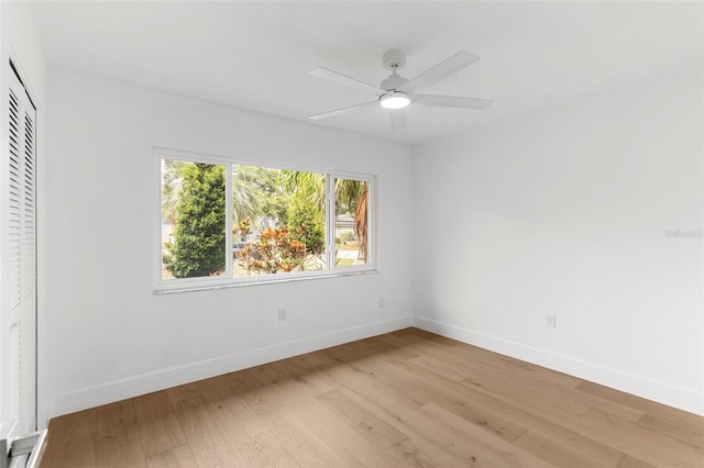 11772 96th Pl, Seminole, FL 33772 - unfurnished bedroom featuring light wood-style flooring, a closet, and ceiling fan