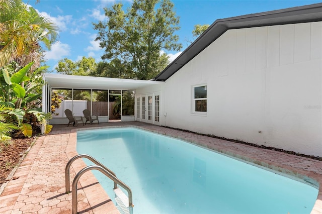 11772 96th Pl, Seminole, FL 33772 - outdoor pool with french doors and a patio area