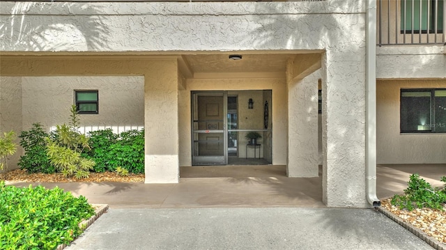 3 Pirates Ln Unit 32A, Punta Gorda, FL 33955 - property entrance featuring stucco siding