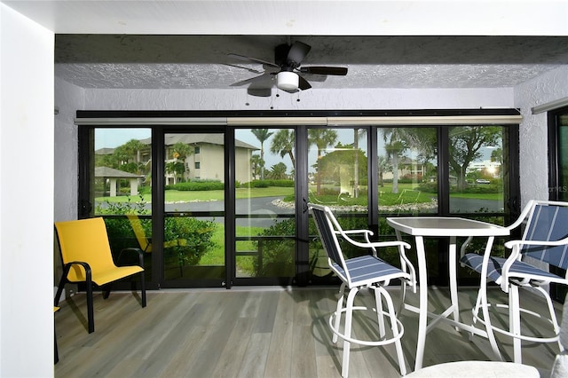3 Pirates Ln Unit 32A, Punta Gorda, FL 33955 - sunroom / solarium with ceiling fan and wood finished floors