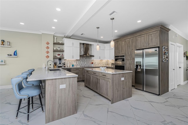 1750 Jamaica Way Unit 131, Punta Gorda, FL 33950 - kitchen featuring appliances with stainless steel finishes, wall chimney exhaust hood, a peninsula, open shelves, and backsplash