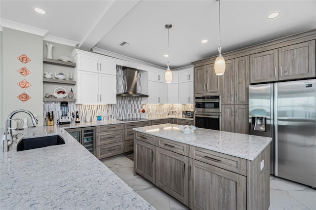 1750 Jamaica Way Unit 131, Punta Gorda, FL 33950 - kitchen with appliances with stainless steel finishes, wall chimney exhaust hood, light marble finish floors, open shelves, and light stone counters