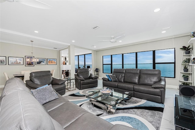 1750 Jamaica Way Unit 131, Punta Gorda, FL 33950 - living room with recessed lighting, marble finish floors, a ceiling fan, and a chandelier