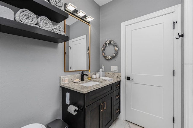 1750 Jamaica Way Unit 131, Punta Gorda, FL 33950 - bathroom with vanity and marble look tiles