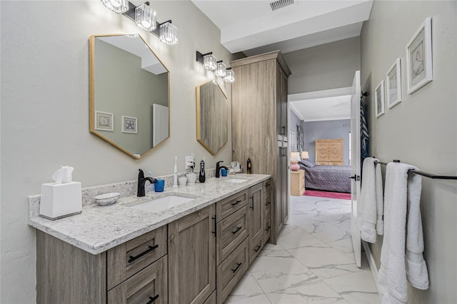1750 Jamaica Way Unit 131, Punta Gorda, FL 33950 - ensuite bathroom with marble look tiles and double vanity
