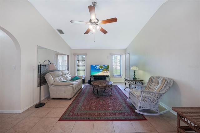 25499 Taltal Dr, Punta Gorda, FL 33983 - tiled living area featuring arched walkways, high vaulted ceiling, and a ceiling fan