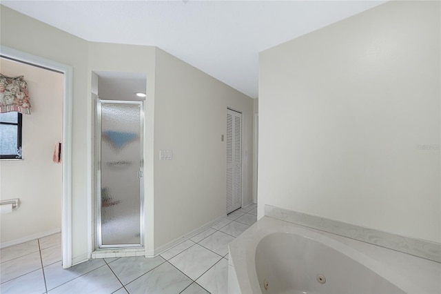 25499 Taltal Dr, Punta Gorda, FL 33983 - bathroom with a shower stall, a tub with jets, and tile patterned floors