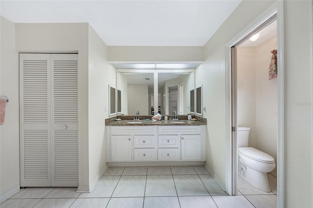 25499 Taltal Dr, Punta Gorda, FL 33983 - bathroom featuring a closet and double vanity