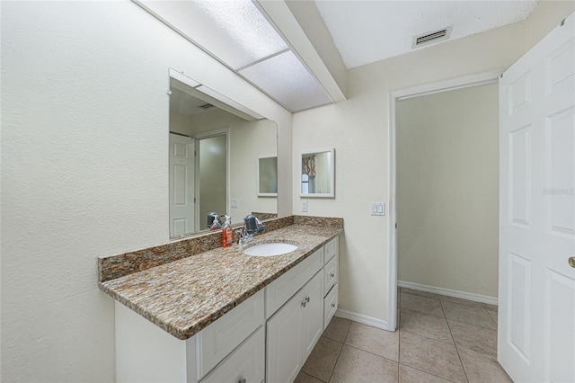 25499 Taltal Dr, Punta Gorda, FL 33983 - bathroom with vanity and tile patterned flooring
