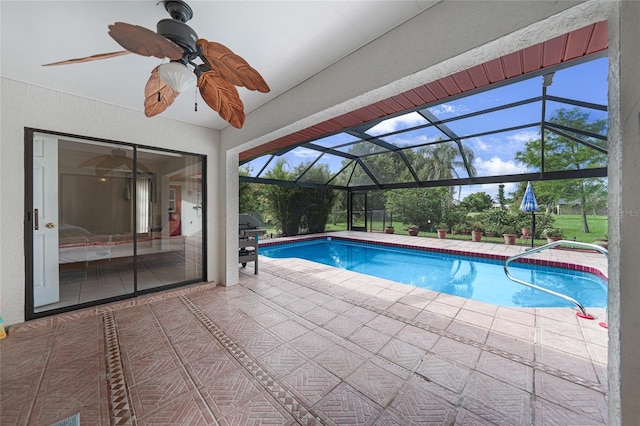 25499 Taltal Dr, Punta Gorda, FL 33983 - swimming pool featuring a patio, a lanai, a ceiling fan, and area for grilling