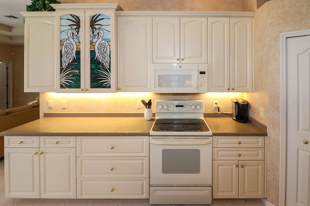 1855 Silver Palm Rd, North Port, FL 34288 - kitchen featuring white appliances and white cabinets
