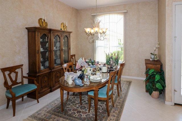 1855 Silver Palm Rd, North Port, FL 34288 - dining space featuring a chandelier, healthy amount of natural light, and light tile patterned flooring