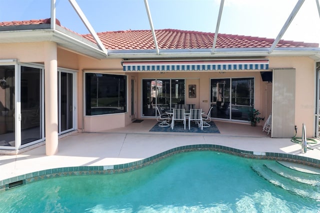1855 Silver Palm Rd, North Port, FL 34288 - swimming pool with a patio and glass enclosure