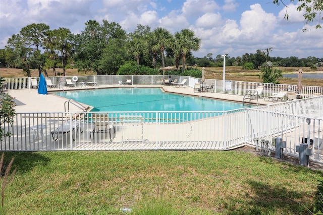 1855 Silver Palm Rd, North Port, FL 34288 - community pool with view of scattered trees and a patio