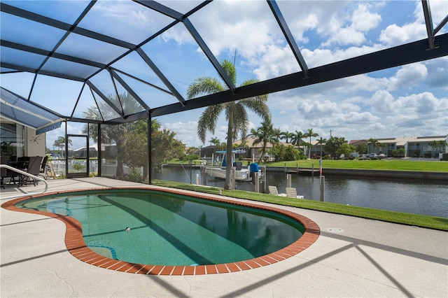 1422 Via Milanese, Punta Gorda, FL 33950 - swimming pool featuring a water view, a patio, glass enclosure, and a dock