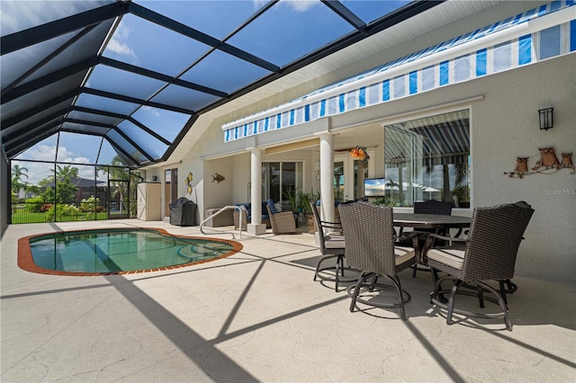 1422 Via Milanese, Punta Gorda, FL 33950 - swimming pool featuring a patio, glass enclosure, and outdoor dining area
