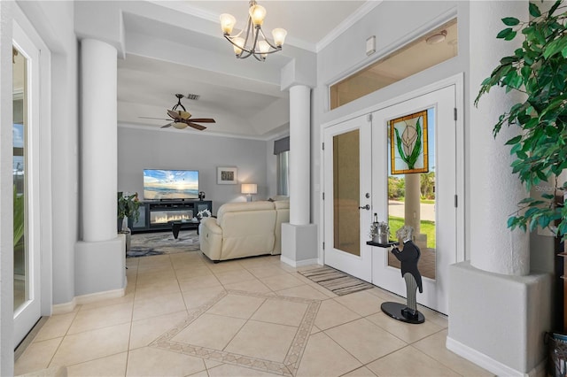 1422 Via Milanese, Punta Gorda, FL 33950 - entryway with ornamental molding, french doors, light tile patterned flooring, ceiling fan, and ornate columns