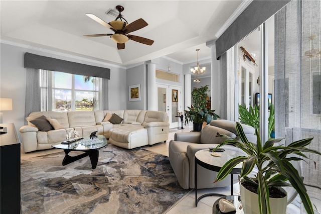 1422 Via Milanese, Punta Gorda, FL 33950 - living area featuring a tray ceiling, light tile patterned flooring, a ceiling fan, crown molding, and a chandelier